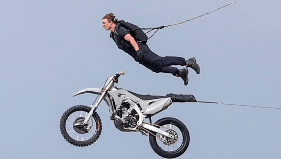 Tom Cruise as Ethan Hunt performing stunt in Mission Impossible Dead Reckoning part 1