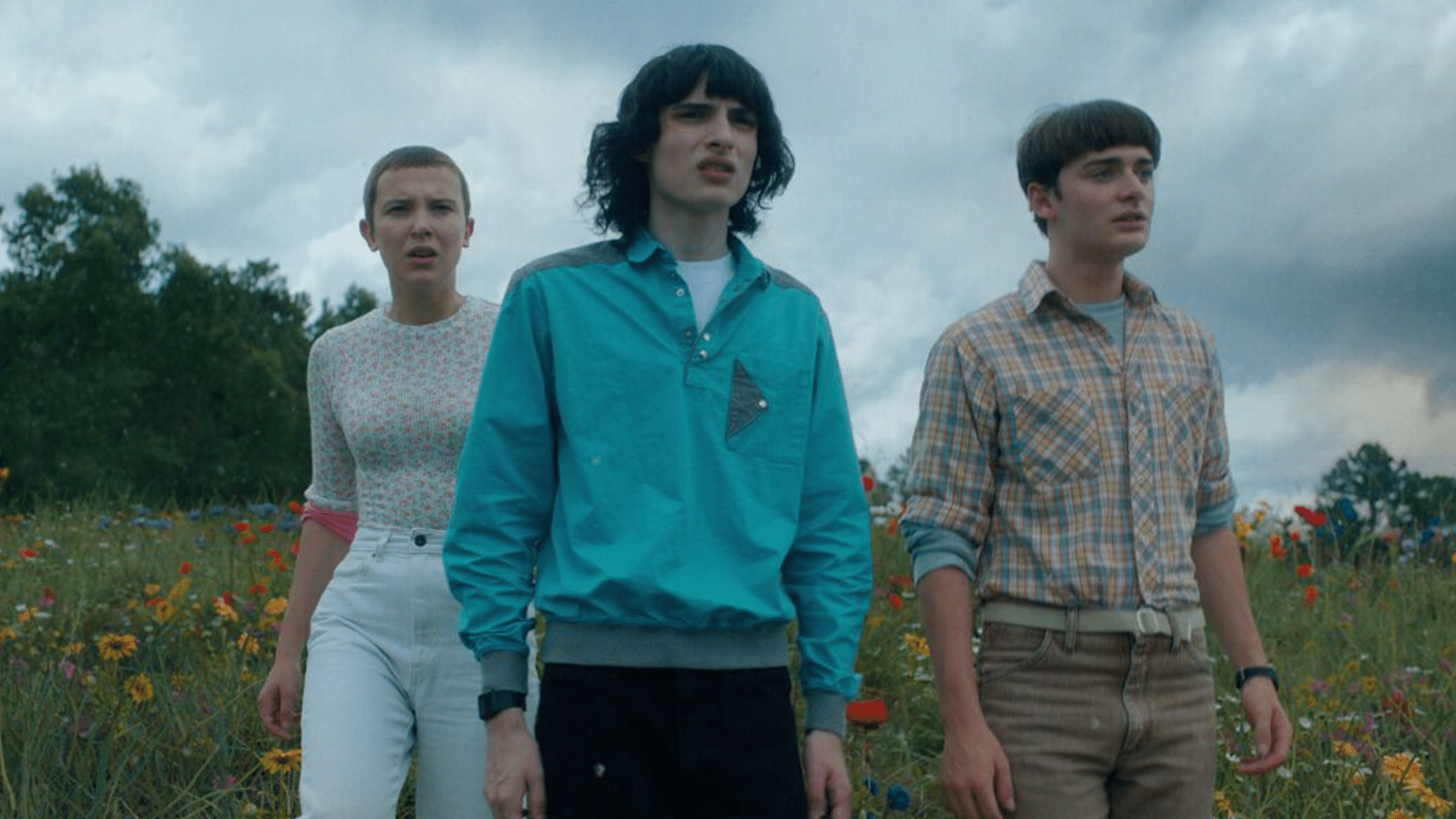 Millie Bobby Brown as Eleven, Finn Wolfhard as Mike Wheeler and Noah Schnapp as Will Byers in STRANGER THINGS