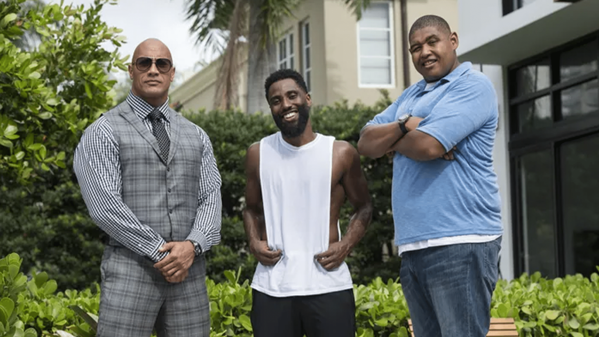 Dwayne Johnson, John David Washington and Omar Benson Miller